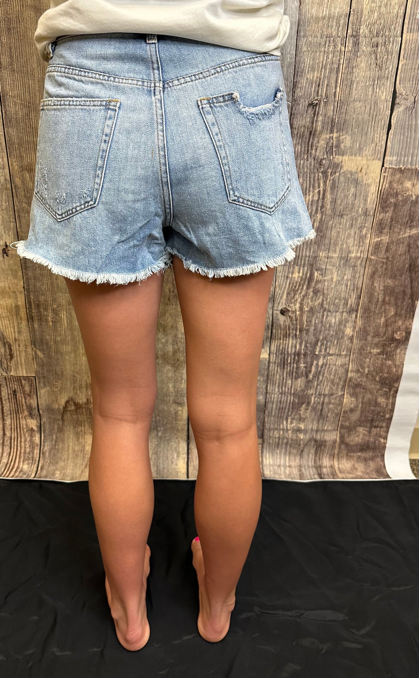 MID RISE DISTRESSED DENIM SHORTS